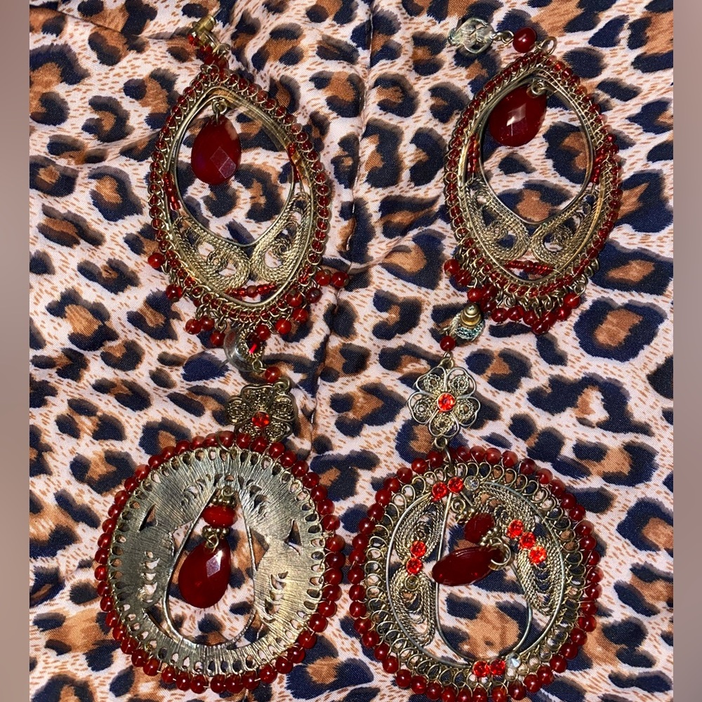 Two pair of Deepa Gurnani Style earrings.